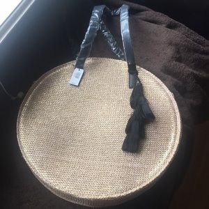 Express gold and beige straw bag